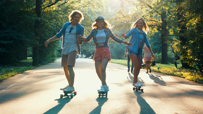 skateboarders on vacation with electric skateboard