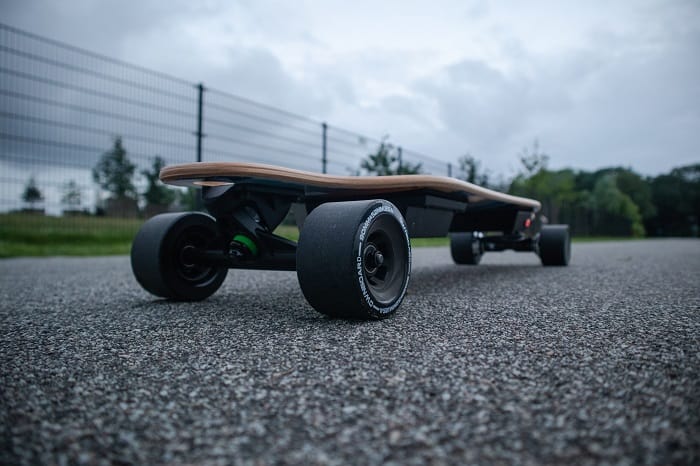 electric skateboard photograph in a road