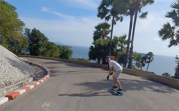 skating down a hill at a viewpoint in Phuket